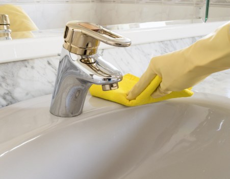 Professional cleaners maintaining shared office and washroom areas in Belgravia